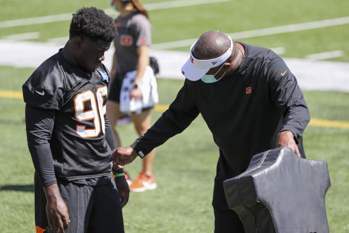 May 14, 2021; Cincinnati, Ohio, USA; Cincinnati Bengals defensive line coach Marion Hobby directs defensive end Cam Sample (96) during NFL minicamp at Paul Brown Stadium. Mandatory Credit: Katie Stratman-USA TODAY Sports